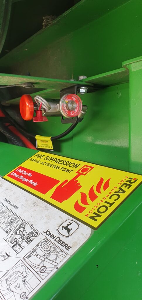 manual activation buttonn reacton fire suppression john deere combine