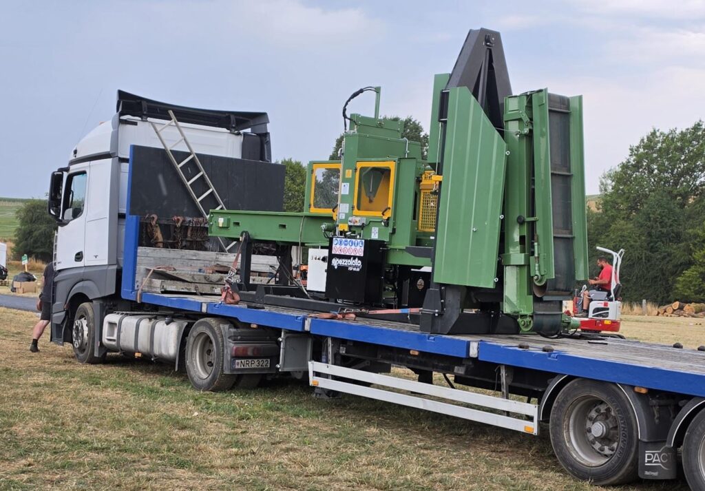 Transportation of Pezzolato industrial firewood production machinery.